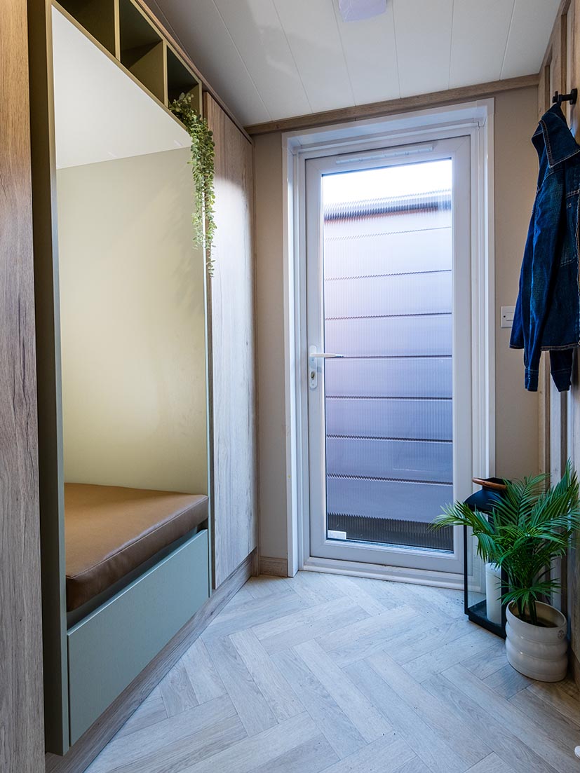 Sycamore Lodge master bedroom with TV, luxury Lake District lodge